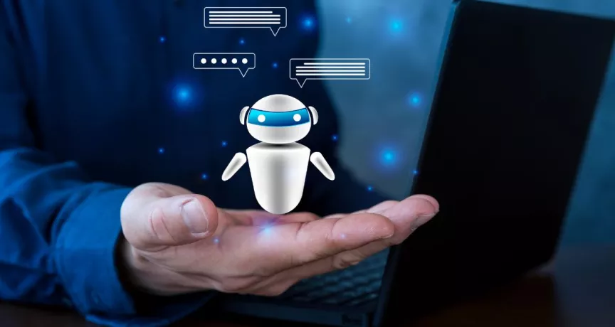 Profesional de Recursos Humanos utilizando inteligencia artificial para analizar información y optimizar la gestión del talento en una empresa.